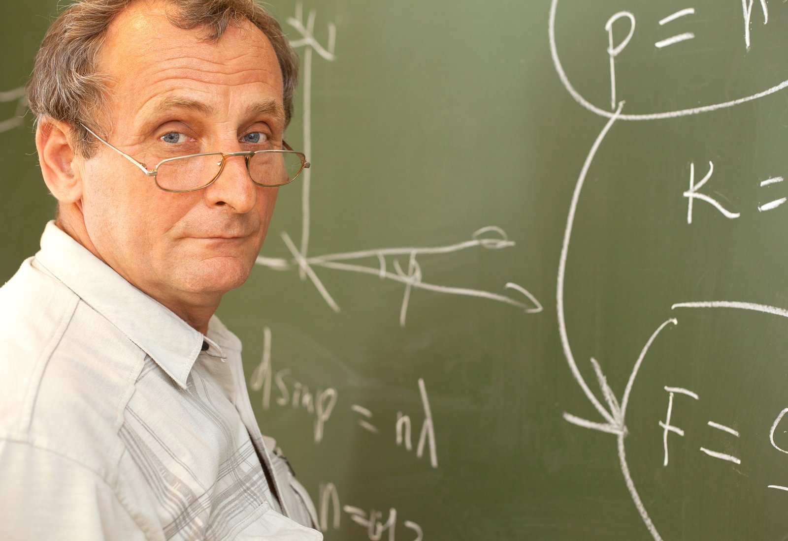 Professor at a chalkboard